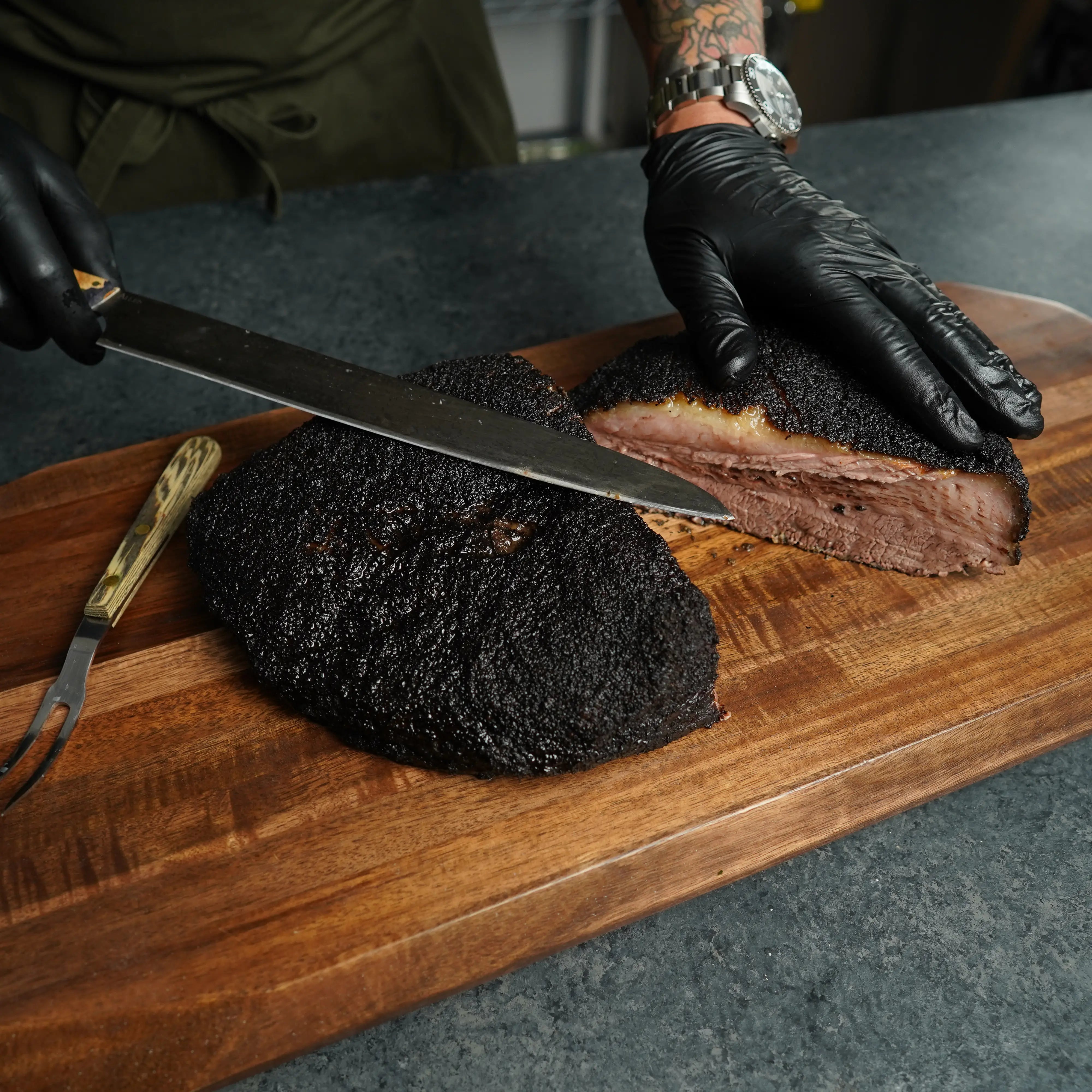 Cooked Brisket on Cutting Board
