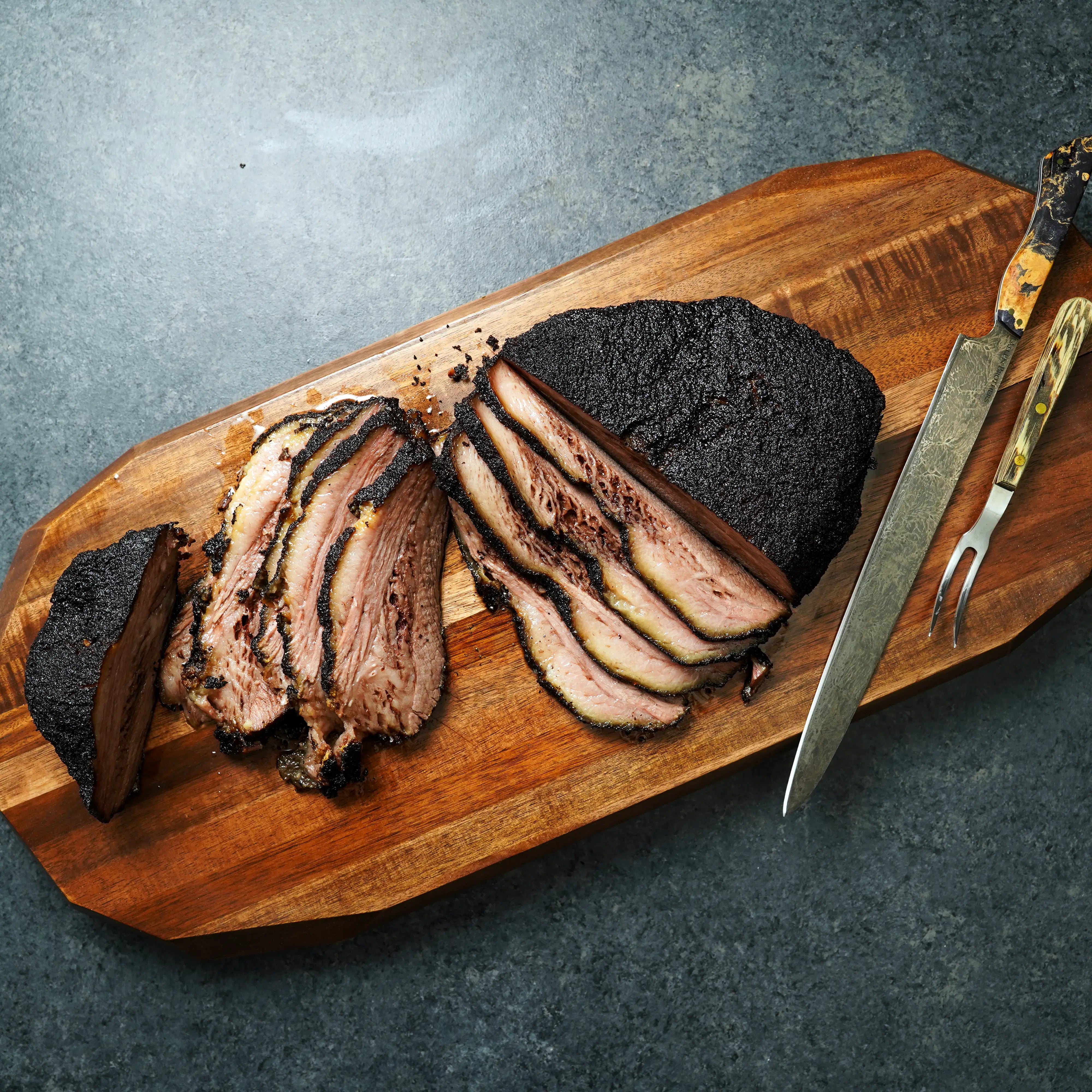 Cooked Brisket on Cutting Boa