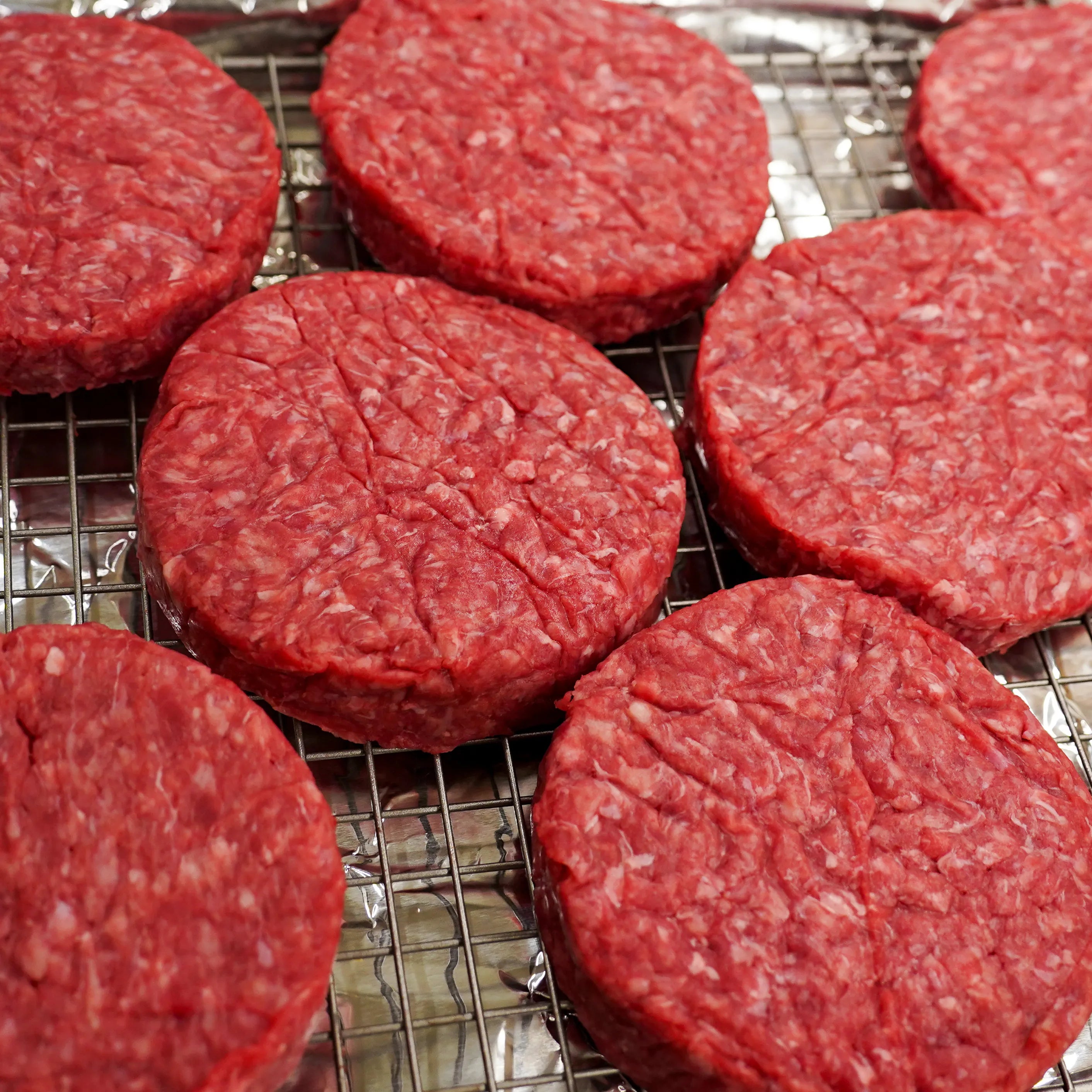 raw burger patties
