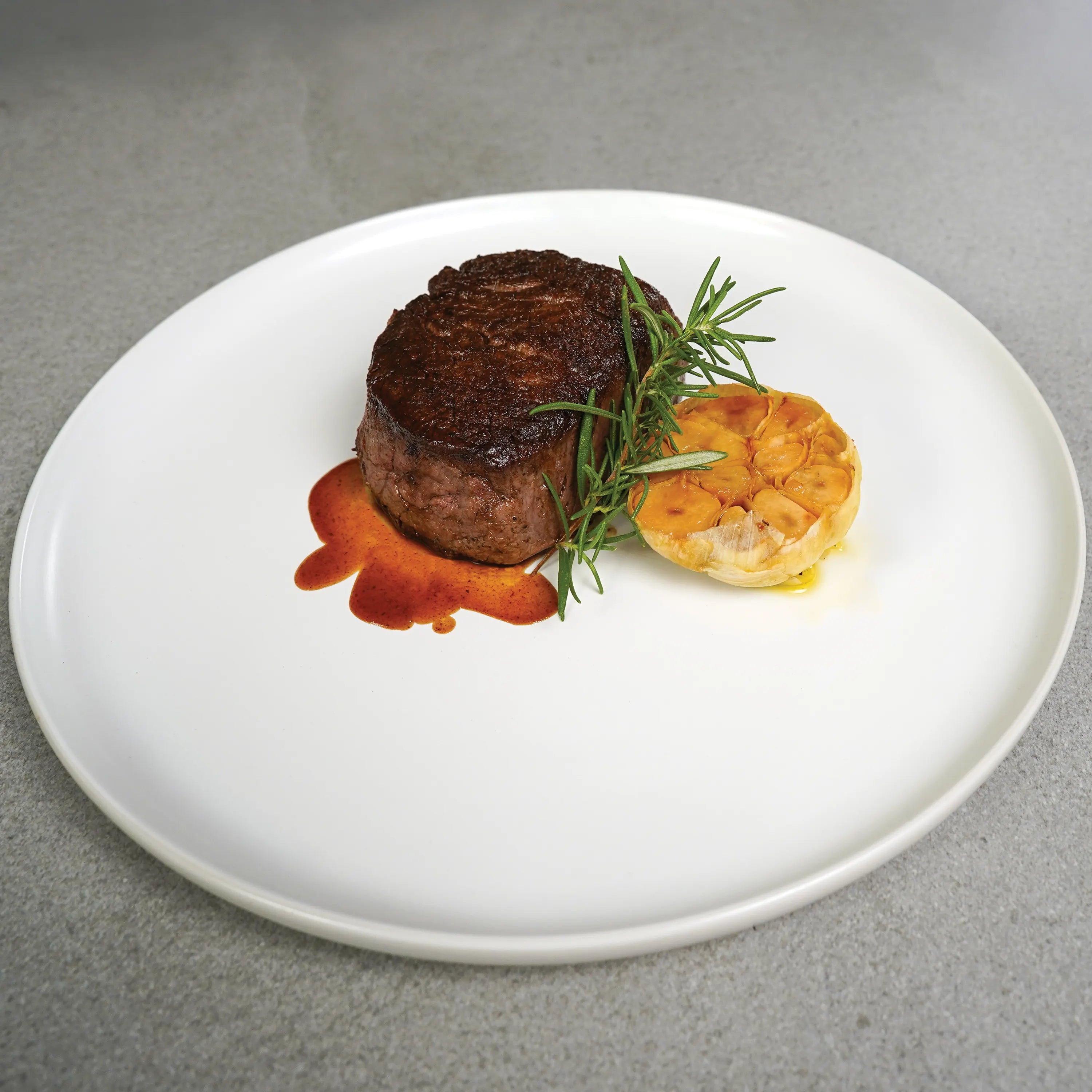 cooked filet on White Plate