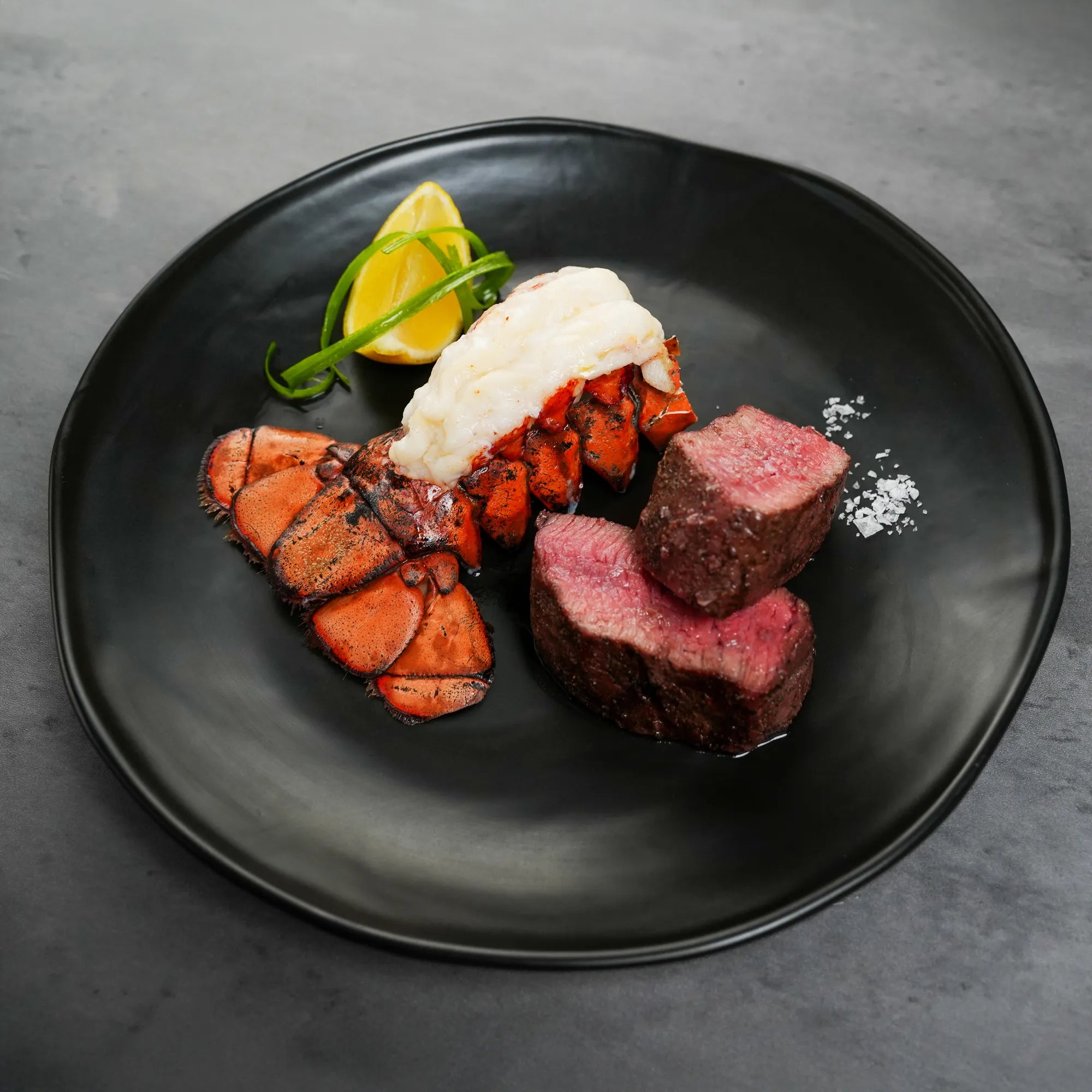 Steak and Lobster on Plate